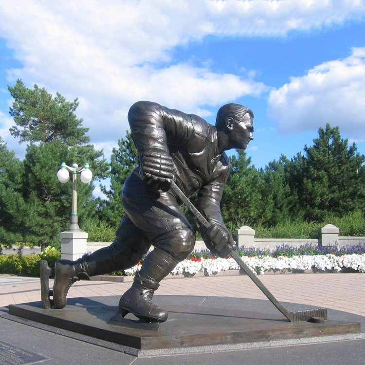 2. 1. bronze ice hockey player sculptures
