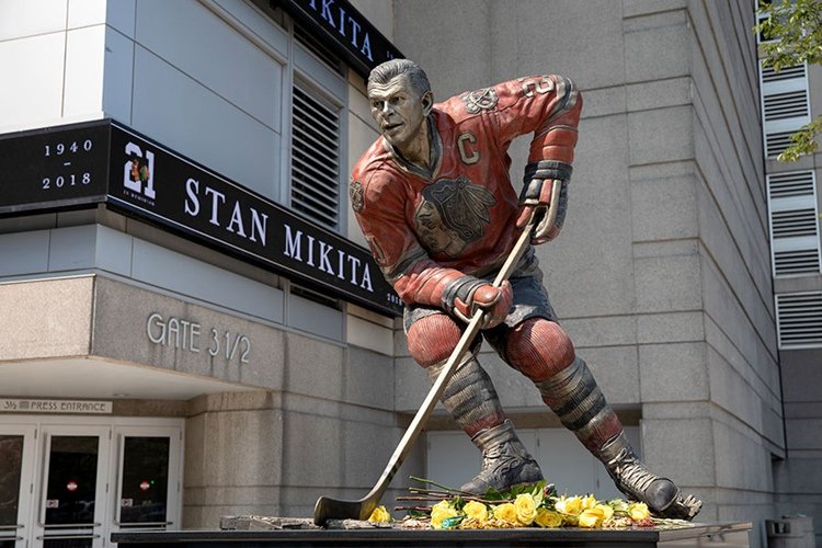 2.2. bronze ice hockey player sculptures