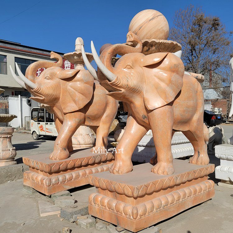 4.1. elephant statue with its trunk raised mily statue 1