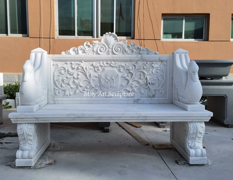 12. white marble bench with swan armrest