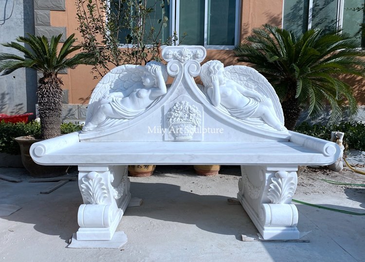 8. white marble bench with little angel backrest